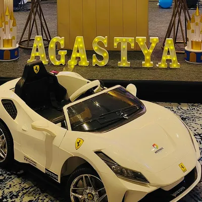 We use large, illuminated marquee letters to spell out the birthday child's name. This personal touch, seen here at Agastya's party, creates a fantastic photo opportunity and makes the celebrant feel special.
