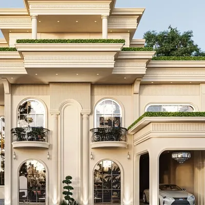 An upcoming project in Rajasthan designed in a classical style. This aesthetic is defined by symmetry, ornate moldings, and arched windows, which we have complemented with modern green roof terraces.