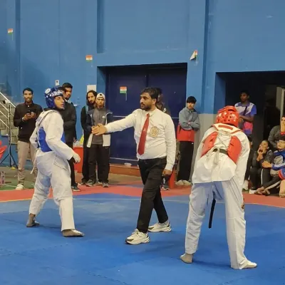 As a referee at the Taekwondo Open selection trial for the 38th National Games. It is an honor to be part of the selection process.