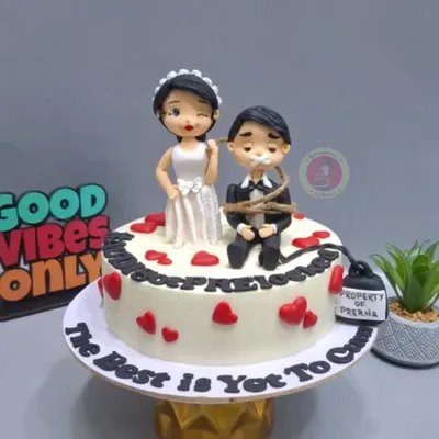 Our bestseller bridal shower cake featuring a playful, handmade bride and groom figurine. It’s a cute and fun way to celebrate without being explicit.