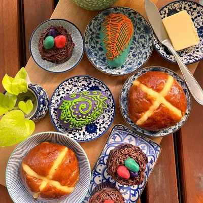 I get so hopped up on Easter cheer. Here's a look at the full spread, including my soft brioche hot cross buns, chocolate fudge nest cupcakes, and colorful marzipan eggs.