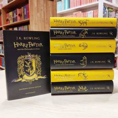 The complete Harry Potter Hufflepuff House Edition series. Each book features unique cover art and house-related content.
