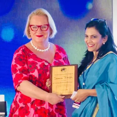 Receiving the "Iconic Women Creating a Better World for All" award at the Women Economic Forum. It was an honour to be recognized for my work in promoting health and wellness.