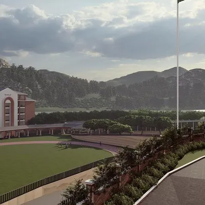Set against a backdrop of rolling hills, our design for this school campus respects and enhances its natural setting. The master plan strategically positions the academic buildings and sports facilities to maximize views and create an inspiring environment for students.