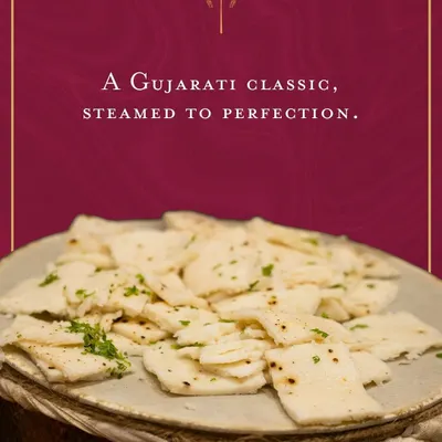 A Gujarati classic, steamed to perfection. Our white dhokla is soft, spongy, and delicately spiced, served as a light and savoury snack that honours our culinary heritage.
