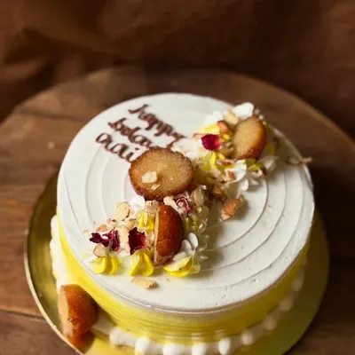 My signature Gulabjamun Rabdi cake. This fusion dessert combines a soft, moist cake with the flavors of creamy rabdi, and is topped with actual gulab jamuns.