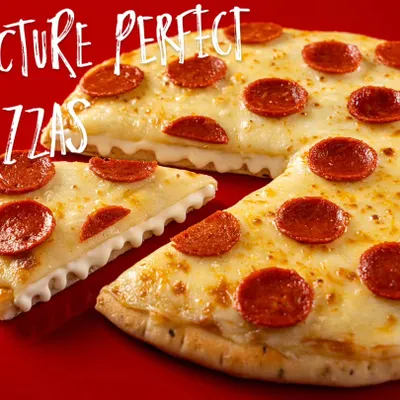 A picture-perfect pepperoni pizza for Ovenstory. Shot against a vibrant red background, this image is designed for maximum impact on delivery apps, with a focus on the cheesy pull and classic toppings.