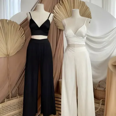 My custom co-ord sets are designed for effortless style. This set includes a minimalist bralette top paired with flowing, wide-leg trousers, creating a balanced and modern silhouette. I tailor each piece to ensure the fit is both comfortable and flattering.