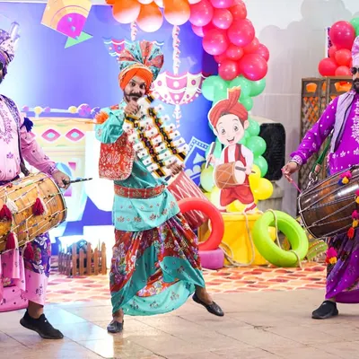 Our vibrant dhol players in traditional Punjabi attire, bringing high-energy music and a festive atmosphere to the celebration.