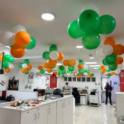 For national holidays, we provide professional and patriotic office decor. This setup for an Independence Day or Republic Day celebration features tricolor balloon bunches arranged across the office ceiling, creating a festive yet respectful environment.