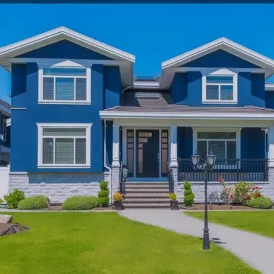A deep blue exterior can give your home a sophisticated and memorable look. Paired with white trim, it's a classic combination that feels both modern and timeless.
