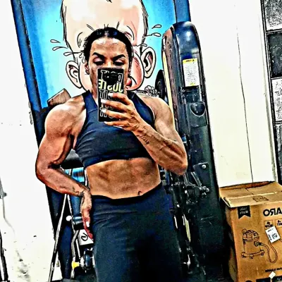 A quick mirror selfie to check the progress. Seeing the definition in my abs and shoulders is what keeps me motivated.