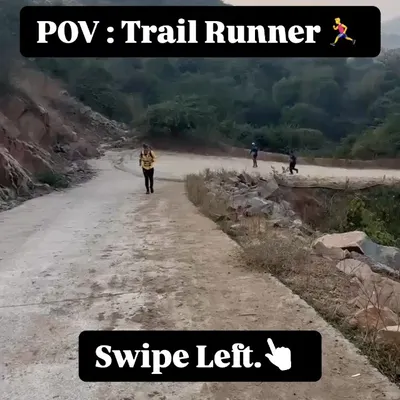 A point-of-view shot of a trail runner on a winding dirt path. This image sets the scene for the unique challenges and beauty of trail running.