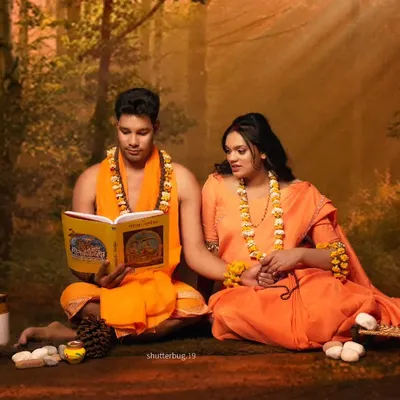 Our highly stylized Ram Sita themed maternity shoot. We created a serene forest setting in our studio for this couple, capturing a moment of them reading scriptures together, embodying peace and tradition.