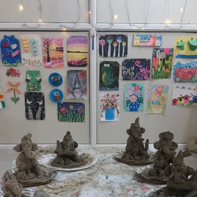 A beautiful display of our handmade Ganesha idols, each one unique and crafted with love during our workshop. The fairy lights add a little magic to the finished creations.