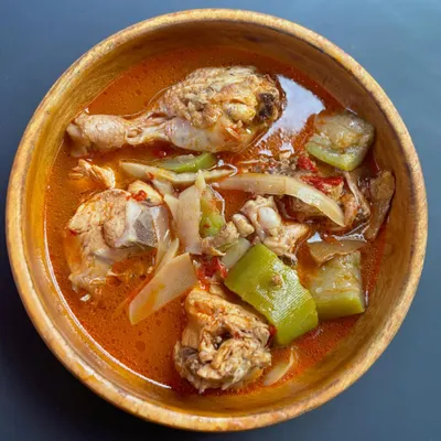 Our Chicken with Bamboo Shoot is a classic Naga comfort food. We cook tender chicken pieces in a light, oil-free broth with fresh bamboo shoot and herbs, letting the freshness of the ingredients shine.
