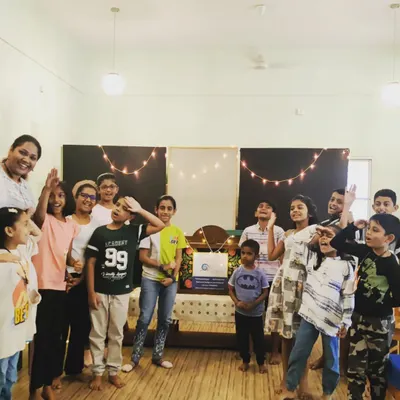 A fun group shot filled with silly poses after our 'Nautical Narratives' session. It’s not just about telling stories; it’s about creating moments of shared joy and laughter.