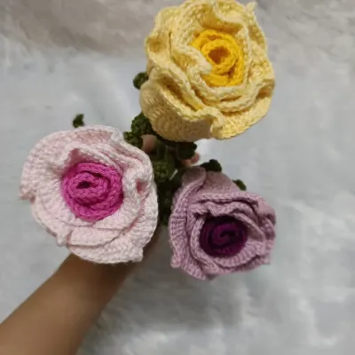If you want something different from the usual red roses, I love making these dual-color versions. This bouquet features a pink, yellow, and lavender rose, each with a darker shade in the center.
