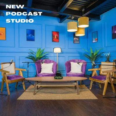 This is our modern and vibrant podcast setup, featuring bold blue walls and plush purple chairs. It's designed to be visually striking on camera, making your content pop while ensuring professional audio quality.