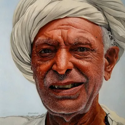 This is a detailed acrylic portrait titled 'Man In A Turban'. It took around 80 hours to complete on cold-pressed Brustro watercolour paper, focusing on the skin texture and the fabric folds of the turban.