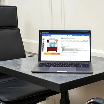 A laptop displaying a product listing for a TCL appliance on Flipkart, demonstrating our experience in creating marketplace-compliant imagery.