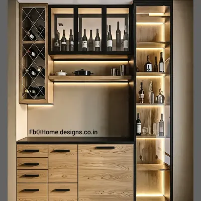 We designed this sophisticated home bar unit with a mix of materials. The unit features a dedicated wine rack, glass-fronted cabinets for liquor bottles, a tall display case with integrated lighting, and wooden drawers for bar tools.