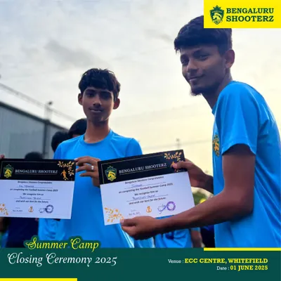 Two of our older participants receive their certificates at the closing ceremony of our 2025 Summer Camp at the ECC Centre, Whitefield.