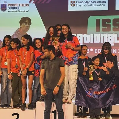 A proud moment on the winner's podium at the ISSO National Games. Our student Naina Rekhi stands tall with her teammates, celebrating a well deserved first place victory after intense competition.
