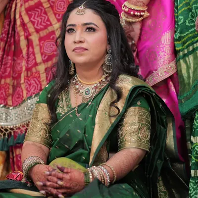 For her engagement, this bride wanted a soft, elegant, and flawless look. Dressed in a beautiful green saree, her makeup features subtle tones and a dreamy, timeless glow.