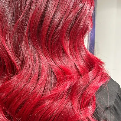 A close-up of the power red. The vibrancy and shine are unmatched, showing the quality of the color and care I provide.