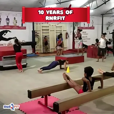 Celebrating 10 years of RnR Fit. This image from our gym captures a decade of building champions, fostering friendships, and promoting a love for gymnastics.