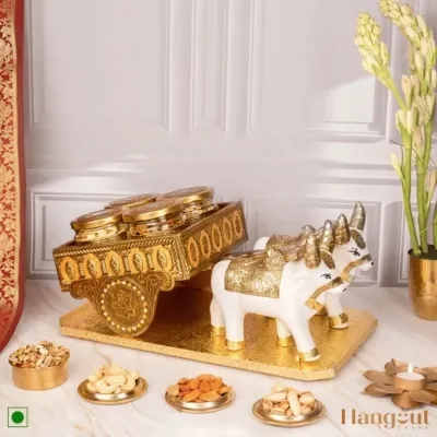 My Sanskriti Diwali Gift Hamper is designed for a touch of tradition. The decorative bullock cart holds jars of festive treats, making it a unique centerpiece and a memorable gift that celebrates our cultural heritage.