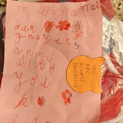 A heartfelt, handmade card from one of our children, included in a relief package for the people of Wayanad. This shows how empathy is woven into our community actions.