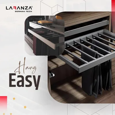 Hang easy with my pull-out trouser rack. The design ensures each pair is held securely and slides out for effortless selection, eliminating wrinkles and the need to dig through a pile.