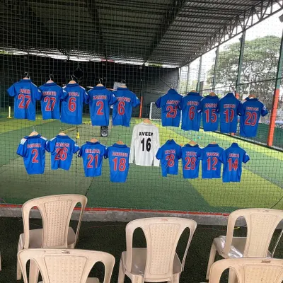 Getting the custom jerseys ready! This is one of our favorite parts, making each child feel like a professional player on the Indian cricket team.