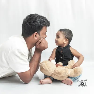 A daughter's first hero is her dad. I love capturing the sweet, simple conversations and shared smiles between a father and his little girl. These are the moments she will treasure forever.