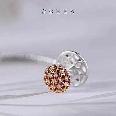 Confidence is also in having pieces made just for you. This is a close-up of my custom ruby and diamond cufflinks, crafted in white gold. From gemstone selection to the intricate backing, I shape every pair around your vision, so they are not just cufflinks, they are your cufflinks.