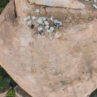 Faith and climbing intersect at Gaali Kallu. Local villagers believe a rock formation on the spire is a statue of the bull-god Basava. We were honored to help them hoist a flag to the top, a strange and invigorating experience.