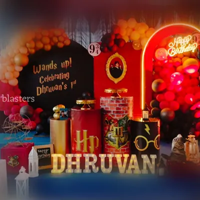 The complete Harry Potter themed birthday setup for Dhruvan's first birthday. Notice the custom pedestals, brick wall patterns, and the iconic font used for the name, creating a truly magical atmosphere for young wizards.