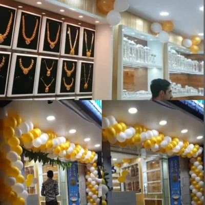 This collage shows a simple and clean balloon decoration for a jewelry shop opening. The white and gold balloon garlands on the ceiling and entrance add a festive, celebratory feel for the launch.