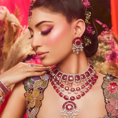 A celebration of bold beauty and femininity. This look features a vibrant purple winged liner, which I designed as part of the overall creative vision for the shoot.