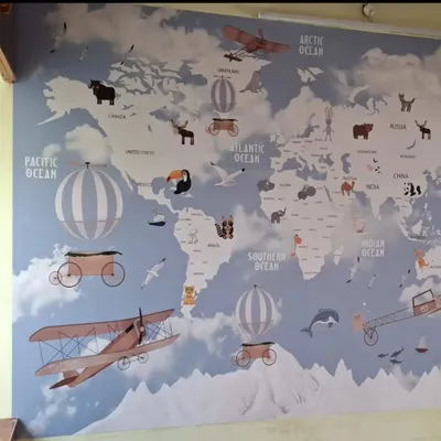 This whimsical world map wallpaper is perfect for a child's room or play area. It's both decorative and educational, featuring continents, oceans, and cute animals to inspire a sense of adventure.