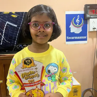 Here is my wonderful student Gatha, proudly holding her first prize trophy from a competition. A proud moment for all of us at Swarmaanas!