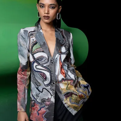 Creative direction and styling for designer Advait. This look features a hand-painted blazer, and I used a graphic green and black set to make the artwork on the jacket pop.