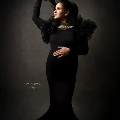 A self-portrait from my own maternity session. I love creating dramatic, fine-art images that tell a story of strength and magic.