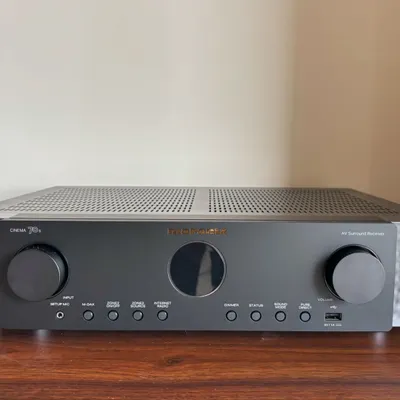 The Marantz Cinema 70s AV Receiver, known for its slim profile and powerful performance. I installed this as part of a 5.1.2 setup, where it drives the Polk Audio speakers and Optoma projector with ease.