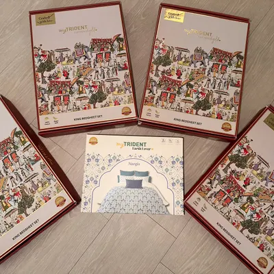 These are the beautiful gift boxes for the Trident King bedsheet sets. The unique illustrated design on the box makes it a wonderful present even before you see the gorgeous sheets inside.
