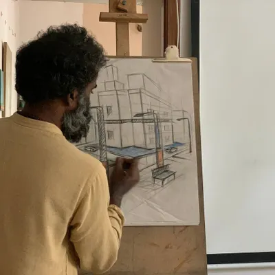 Here, one of our mentors demonstrates a two-point perspective drawing. Understanding perspective is a fundamental skill we teach to help students create drawings with realistic depth and structure.