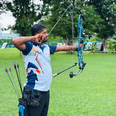 This is my shooting form with a professional compound bow. I emphasize a stable stance, a smooth draw, and a clean release in my coaching, techniques I've perfected through years of national-level competition.