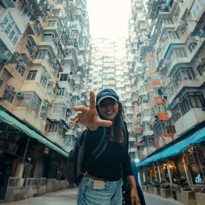 Here I am at the famous "Transformers building" in Hong Kong. For me, travel and photography are inseparable. This photo, with the quote from Ansel Adams, sums up my philosophy: "You don't take a photograph, you make it."